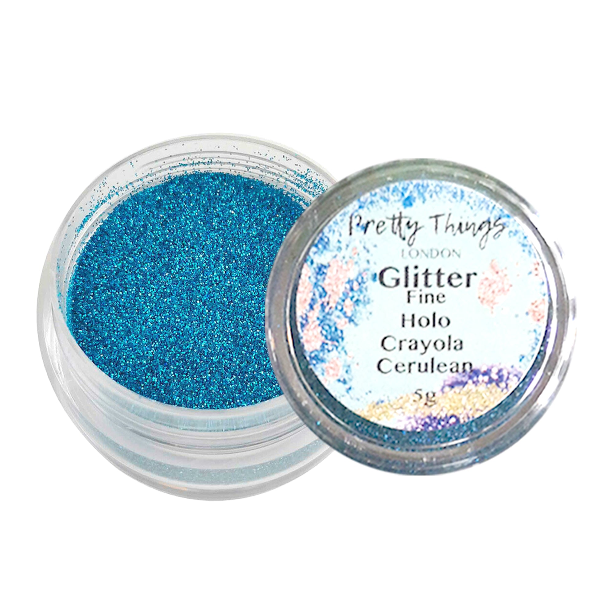 1.	Pretty Things London Fine Holographic Glitter in Crayola Curelean 5g in open container showing sparkles