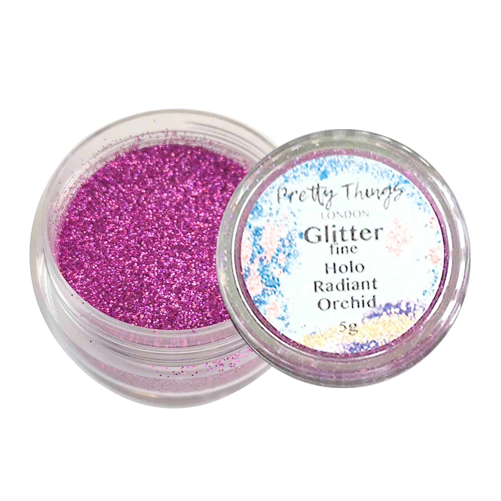 1.	Pretty Things London Fine Holographic Glitter in Radiant Orchid 5g in open container showing sparkles